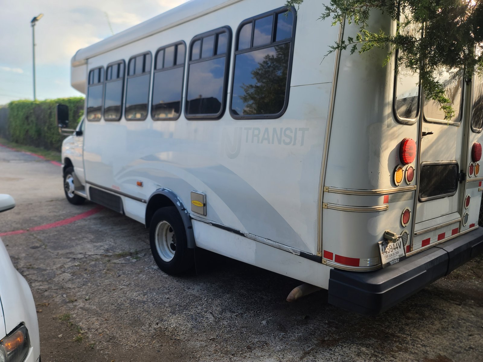 Side view of the mobile barbershop bus