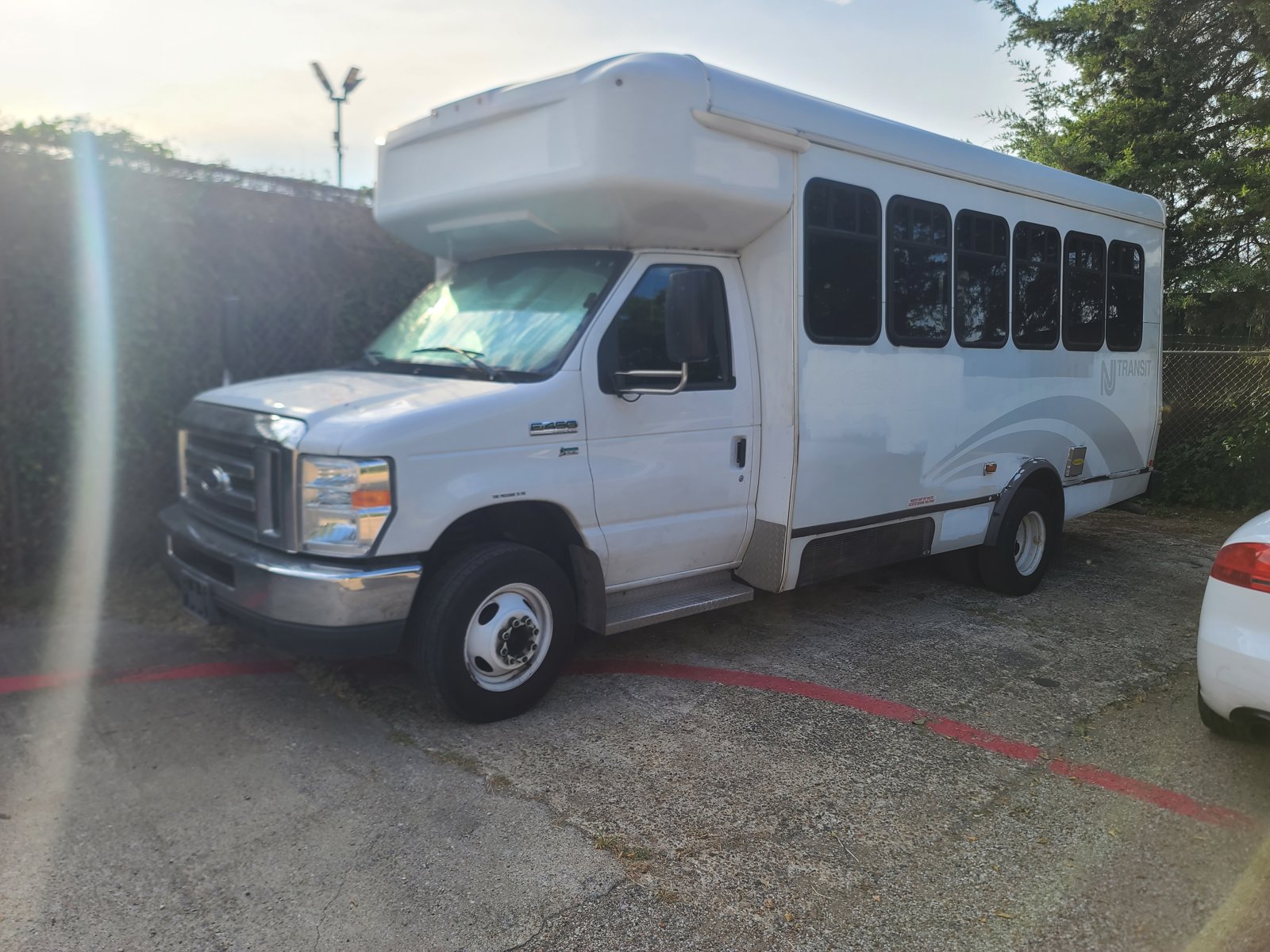 The BehindDaCutz mobile barbershop bus parked and ready to roll